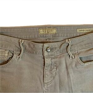 Grungey khaki authentic ‘90s Guess jeans. Cropped cigarette.